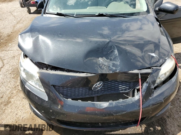 2010 Toyota Corolla z VIN 2T1BU4EE9AC197170, wystawiony jako Copart lot #64015795 z przebiegiem 113 607 mil mil oraz Szkoda całkowita • Salvage title. Historia ofert i sprzedaży dostępna na DreamBid. Obrazek 11.