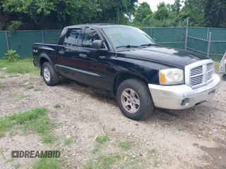 2005 Dodge Dakota SLT with VIN 1D7HW48N35S159220, listed as a IAAI auction lot 42773291 with 324,365 mi miles and . Bid and sale history available at DreamBid. Image 1.