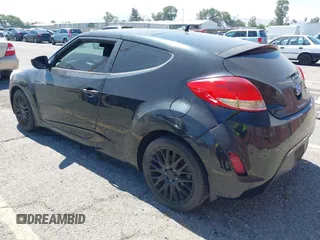 2013 Hyundai Veloster w/Black Int with VIN KMHTC6AD4DU151409, listed as a IAAI auction lot 42639582 with 283,208 mi miles and . Bid and sale history available at DreamBid. Image 3.