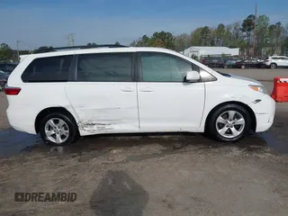 2015 Toyota Sienna LE AAS with VIN 5TDKK3DC2FS590667, listed as a IAAI auction lot 41997673 with 169,828 mi miles. Bid and sale history available at carsss.com. Image 13.