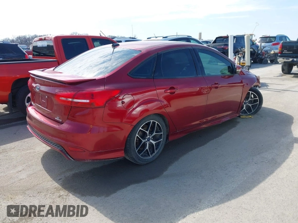 2015 Ford Focus SE with VIN 1FADP3F24FL362949, listed as a IAAI auction lot 41621904 with 104,447 mi miles. Bid and sale history available at carsss.com. Image 4.