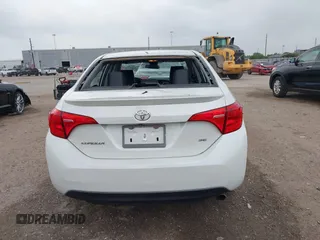 2019 Toyota Corolla L with VIN 5YFBURHE0KP875377, listed as a IAAI auction lot 41904405 with 73,604 mi miles and . Bid and sale history available at DreamBid. Image 16.