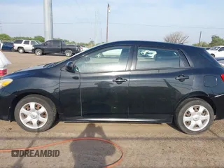 2009 Toyota Matrix with VIN 2T1KU40E69C091858, listed as a IAAI auction lot 41925490 with 153,161 mi miles. Bid and sale history available at carsss.com. Image 14.
