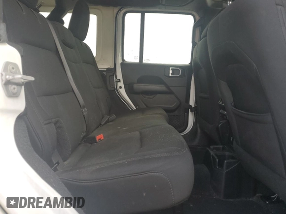 2019 Jeep Wrangler Unlimited Sahara с VIN 1C4HJXEG6KW580031, выставлен на аукционе Copart как лот 59687835 с пробегом 136 590 миль миль и Списание • Salvage title. История ставок и продаж доступна на DreamBid. Изображение 10.