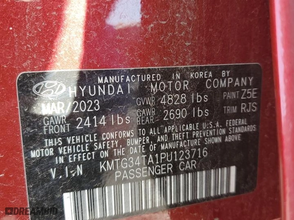 2023 Genesis G70 2.0T with VIN KMTG34TA1PU123716, listed as a Copart auction lot 44340295 with 26,963 mi miles and Salvage Title. Bid and sale history available at carsss.com. Image 14.