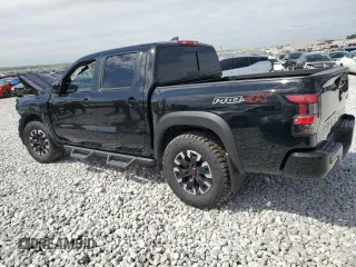 2023 Nissan Frontier Pro-4X with VIN 1N6ED1EK9PN653818, listed as a Copart auction lot 50932735 with 55,466 mi miles and Salvage title. Bid and sale history available at DreamBid. Image 2.