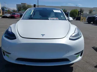 2023 Tesla Model Y Long Range with VIN 7SAYGDEE2PF632121, listed as a IAAI auction lot 41798780 with 53,773 mi miles. Bid and sale history available at carsss.com. Image 12.