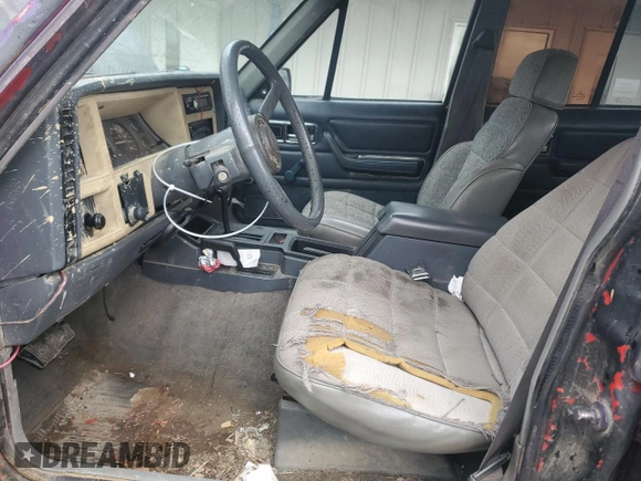 1993 Jeep Cherokee Sport with VIN 1J4FJ68S6PL506709, listed as a Copart auction lot 86638434 with 253,923 mi miles and Salvage Title. Bid and sale history available at carsss.com. Image 7.