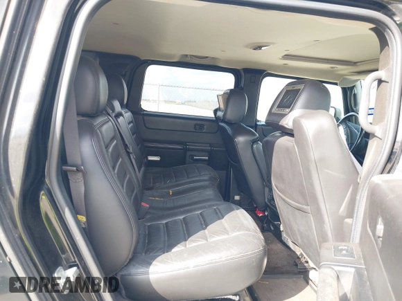 2006 Hummer H2 with VIN 5GRGN23U66H120601, listed as a IAAI auction lot 41524634 with 155,003 mi miles. Bid and sale history available at carsss.com. Image 8.