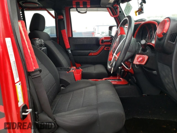 2012 Jeep Wrangler Unlimited Sport RHD with VIN 1C4BJWKGXCL102296, listed as a Copart auction lot 48905975 with Not provided miles and Salvage title. Bid and sale history available at DreamBid. Image 7.