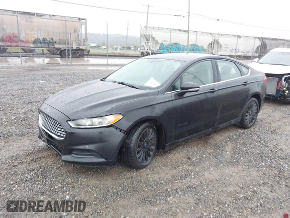 2015 Ford Fusion SE Hybrid with VIN 3FA6P0LU4FR236282, listed as a IAAI auction lot 42006659 with 146,931 mi miles and . Bid and sale history available at DreamBid. Image 2.