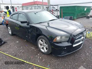 2014 Dodge Charger SE with VIN 2C3CDXBG5EH267629, listed as a IAAI auction lot 41968076 with 171,195 mi miles and . Bid and sale history available at carsss.com. Image 1.