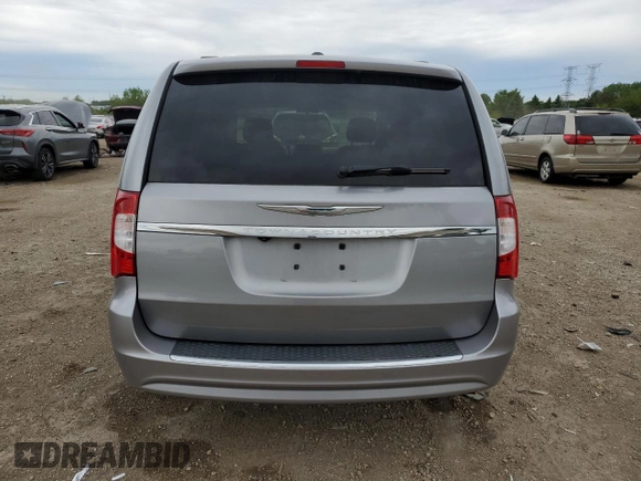 2014 Chrysler Town & Country Touring with VIN 2C4RC1BG1ER225720, listed as a Copart auction lot 58071165 with 104,502 mi miles and Salvage title. Bid and sale history available at DreamBid. Image 6.