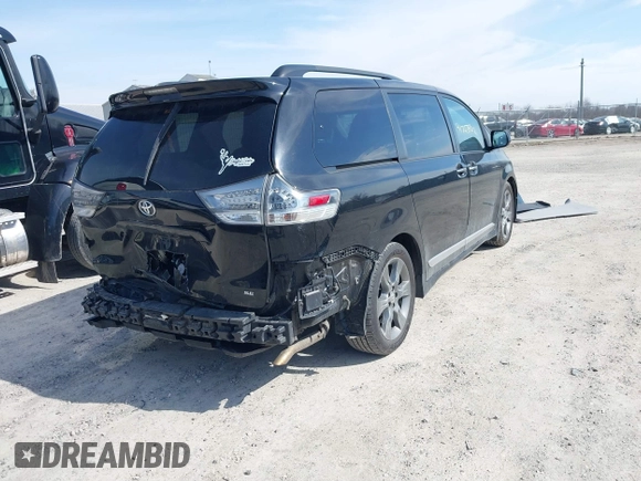 2015 Toyota Sienna SE with VIN 5TDXK3DC9FS652765, listed as a IAAI auction lot 41723922 with 105,679 mi miles. Bid and sale history available at carsss.com. Image 4.