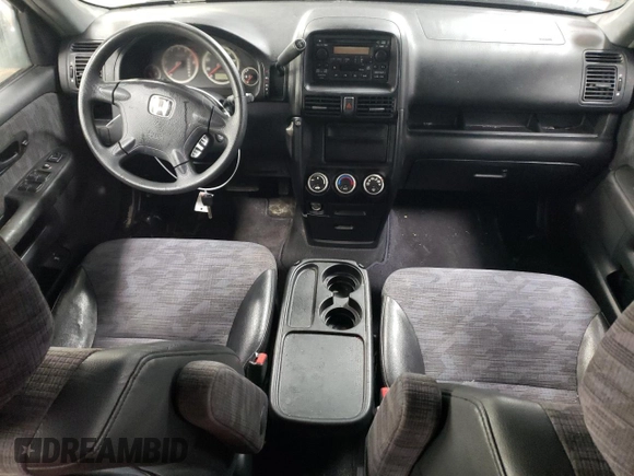 2002 Honda CR-V LX with VIN JHLRD68512C009941, listed as a Copart auction lot 87699075 with 133,311 mi miles and Salvage Title. Bid and sale history available at DreamBid. Image 8.