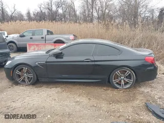 2014 BMW M6 with VIN WBSLX9C58ED160558, listed as a IAAI auction lot 41553209 with 154,789 mi miles. Bid and sale history available at carsss.com. Image 15.