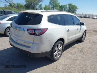 2013 Chevrolet Traverse LTZ z VIN 1GNKVLKD8DJ107168, wystawiony jako IAAI lot #42242078 z przebiegiem 271 640 mil mil oraz . Historia ofert i sprzedaży dostępna na DreamBid. Obrazek 4.