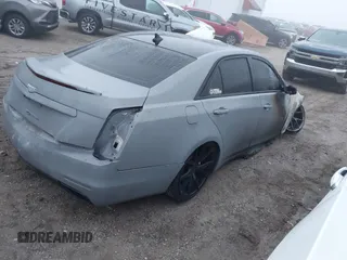 2014 Cadillac CTS Luxury AWD with VIN 1G6AX5SX0E0148876, listed as a IAAI auction lot 41134364 with Not Provided miles and . Bid and sale history available at DreamBid. Image 4.