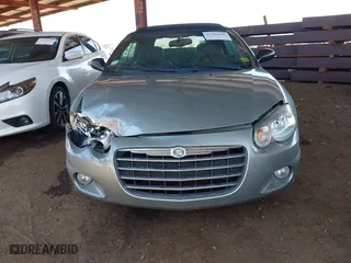 2004 Chrysler Sebring LXi with VIN 1C3EL55R54N338136, listed as a IAAI auction lot 41980206 with 98,572 mi miles. Bid and sale history available at carsss.com. Image 6.