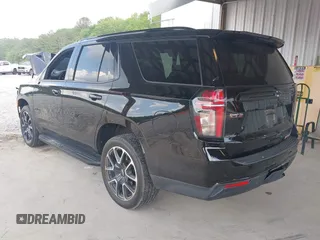 2023 Chevrolet Tahoe RST with VIN 1GNSCRKD2PR531394, listed as a IAAI auction lot 42147801 with 23,423 mi miles and . Bid and sale history available at DreamBid. Image 3.