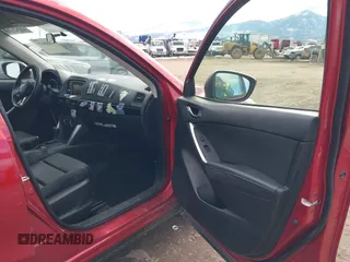 2014 Mazda CX-5 Touring with VIN JM3KE2CY3E0355296, listed as a IAAI auction lot 41688625 with 164,390 mi miles. Bid and sale history available at carsss.com. Image 5.