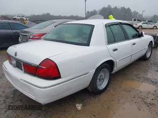 2001 Mercury Grand Marquis LS with VIN 2MEFM75W41X672360, listed as a IAAI auction lot 41418594 with 73,717 mi miles and . Bid and sale history available at DreamBid. Image 4.