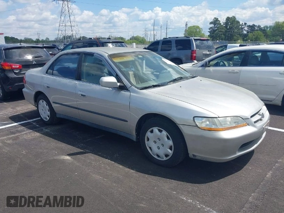 1999 Honda Accord LX z VIN 1HGCG5648XA164103, wystawiony jako IAAI lot #42020624 z przebiegiem 244 346 mil mil oraz . Historia ofert i sprzedaży dostępna na DreamBid. Obrazek 1.