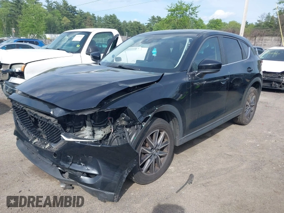 2018 Mazda CX-5 Touring z VIN JM3KFBCM9J0358997, wystawiony jako IAAI lot #42332606 z przebiegiem 93 952 mil mil oraz . Historia ofert i sprzedaży dostępna na DreamBid. Obrazek 18.