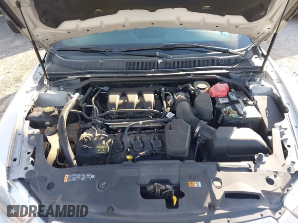 2013 Ford Taurus SEL with VIN 1FAHP2H88DG171375, listed as a IAAI auction lot 42110345 with 169,000 mi miles and . Bid and sale history available at DreamBid. Image 10.
