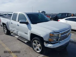 2014 Chevrolet Silverado 1500 LT with VIN 1GCRCREH0EZ399724, listed as a IAAI auction lot 41572451 with 61,799 mi miles and . Bid and sale history available at DreamBid. Image 1.