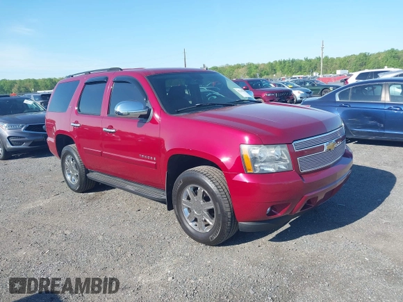 2007 Chevrolet Tahoe LTZ z VIN 1GNFK13077J294577, wystawiony jako IAAI lot #42144278 z przebiegiem 168 054 mil mil oraz . Historia ofert i sprzedaży dostępna na DreamBid. Obrazek 1.