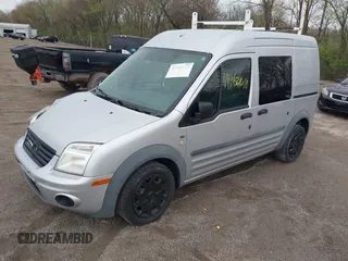 2010 Ford Transit Connect XLT z VIN NM0KS9BN0AT020410, wystawiony jako IAAI lot #41962010 z przebiegiem 253 627 mil mil oraz . Historia ofert i sprzedaży dostępna na DreamBid. Obrazek 2.