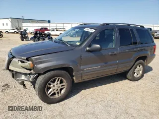 2004 Jeep Grand Cherokee Laredo z VIN 1J4GW48S14C209580, wystawiony jako Copart lot #58967745 z przebiegiem 214 009 mil mil oraz Szkoda całkowita • Salvage title. Historia ofert i sprzedaży dostępna na DreamBid. Obrazek 1.