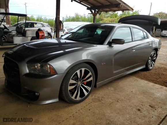 2012 Dodge Charger SRT8 with VIN 2C3CDXEJ1CH240058, listed as a Copart auction lot 73943004 with 72,013 mi miles and Salvage Title. Bid and sale history available at carsss.com. Image 1.