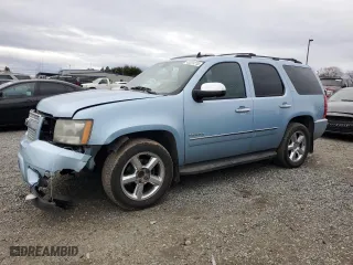 2011 Chevrolet Tahoe LTZ with VIN 1GNSCCE09BR276970, listed as a Copart auction lot 43201215 with 148,537 mi miles and Salvage Title. Bid and sale history available at carsss.com. Image 1.