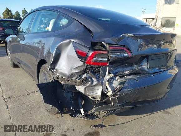 2022 Tesla Model 3 Long Range with VIN 5YJ3E1EB4NF293635, listed as a IAAI auction lot 41388234 with 28,396 mi miles and . Bid and sale history available at DreamBid. Image 6.