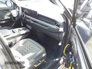 2024 Kia EV9 Wind z VIN KNDAFFS52R6023305, wystawiony jako IAAI lot #41582609 z przebiegiem 23 941 mil mil oraz . Historia ofert i sprzedaży dostępna na DreamBid. Obrazek 5.