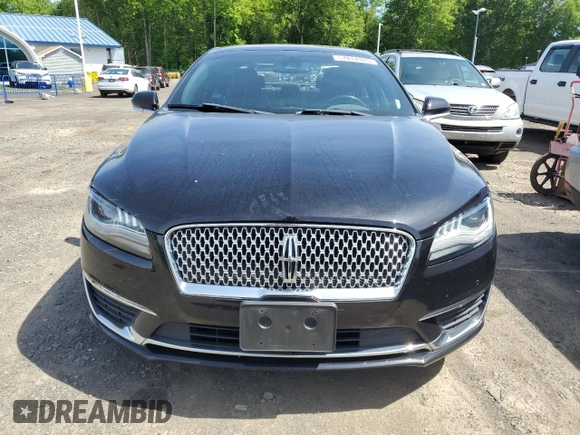 2019 Lincoln MKZ Reserve II z VIN 3LN6L5E90KR607021, wystawiony jako Copart lot #57874945 z przebiegiem 71 061 mil mil oraz Szkoda całkowita • Salvage title. Historia ofert i sprzedaży dostępna na DreamBid. Obrazek 5.
