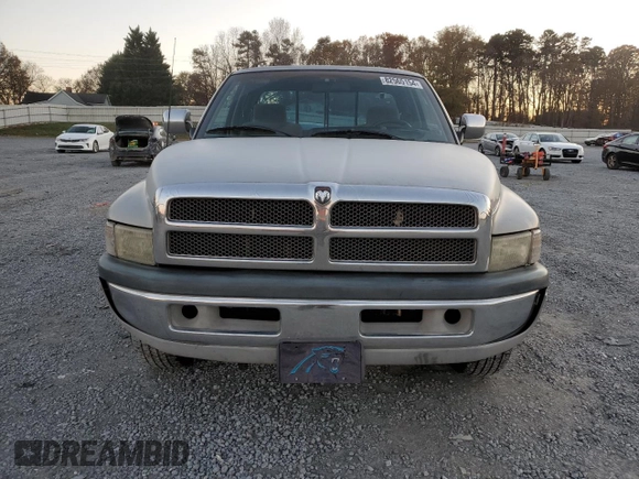 1996 Dodge 1500 z VIN 3B7HC13Y8TG197971, wystawiony jako Copart lot #82565154 z przebiegiem 248 833 mil mil oraz Szkoda całkowita • Salvage title. Historia ofert i sprzedaży dostępna na DreamBid. Obrazek 5.