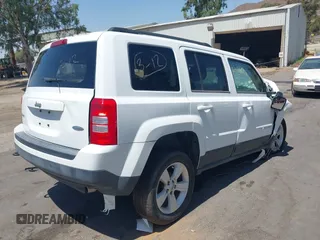 2014 Jeep Patriot Latitude with VIN 1C4NJRFB4ED549734, listed as a IAAI auction lot 42543649 with Not provided miles and . Bid and sale history available at DreamBid. Image 4.