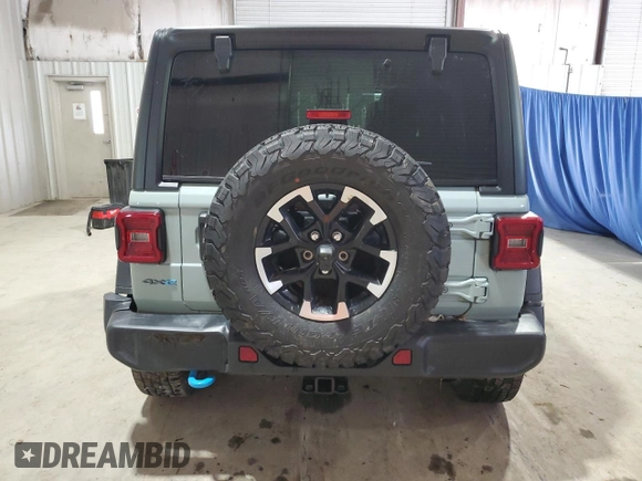 2024 Jeep Wrangler Rubicon with VIN 1C4RJXR67RW293197, listed as a Copart auction lot 59886995 with Not provided miles and Salvage title. Bid and sale history available at DreamBid. Image 6.