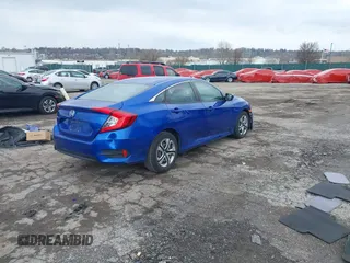 2018 Honda Civic LX with VIN 2HGFC2F59JH610350, listed as a IAAI auction lot 41892911 with 115,501 mi miles and . Bid and sale history available at DreamBid. Image 4.