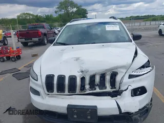 2015 Jeep Cherokee Sport z VIN 1C4PJMAB6FW773872, wystawiony jako IAAI lot #42376516 z przebiegiem 135 209 mil mil oraz . Historia ofert i sprzedaży dostępna na DreamBid. Obrazek 12.