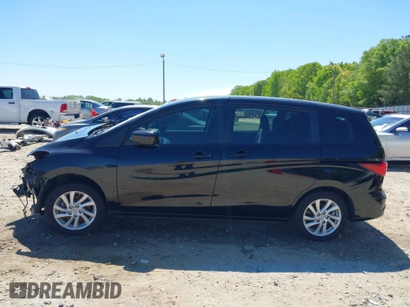 2012 Mazda 5 Sport with VIN JM1CW2BL4C0104669, listed as a IAAI auction lot 42048877 with 115,660 mi miles and . Bid and sale history available at DreamBid. Image 15.