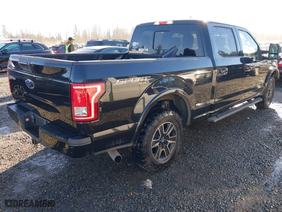 2015 Ford F-150 XLT w/HD Payload Pkg with VIN 1FTFW1EG5FFC13942, listed as a IAAI auction lot 41392709 with 196,416 mi miles. Bid and sale history available at carsss.com. Image 4.