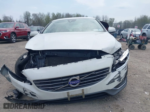 2014 Volvo S60 T5 z VIN YV1612FH8E1292976, wystawiony jako IAAI lot #42129708 z przebiegiem 162 083 mil mil oraz . Historia ofert i sprzedaży dostępna na DreamBid. Obrazek 13.