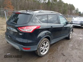 2016 Ford Escape Titanium with VIN 1FMCU9J91GUA59639, listed as a IAAI auction lot 41058369 with 138,046 mi miles. Bid and sale history available at carsss.com. Image 4.