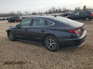 2022 Hyundai Sonata Hybrid Blue with VIN KMHL24JJ6NA048279, listed as a Copart auction lot 49585045 with 59,419 mi miles and Salvage Title. Bid and sale history available at carsss.com. Image 2.