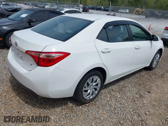 2019 Toyota Corolla L with VIN 5YFBURHE8KP949824, listed as a IAAI auction lot 41904385 with 112,054 mi miles. Bid and sale history available at carsss.com. Image 4.