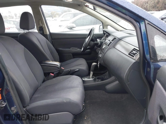 2008 Nissan Versa 1.8 S with VIN 3N1BC13E78L380632, listed as a IAAI auction lot 41562724 with 166,899 mi miles. Bid and sale history available at carsss.com. Image 5.